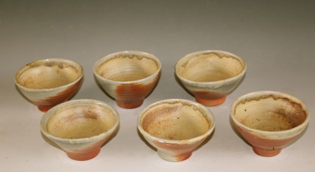 Sake cups, Fired on top of previous Oval Curved Platter.,  Helmer Mine Porcelain Body, Fall 2013 