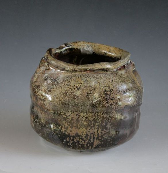 Susan Kotulak, Fall 2013, Lizella clay body wtih Salt Shino, lower back of middle stack.  