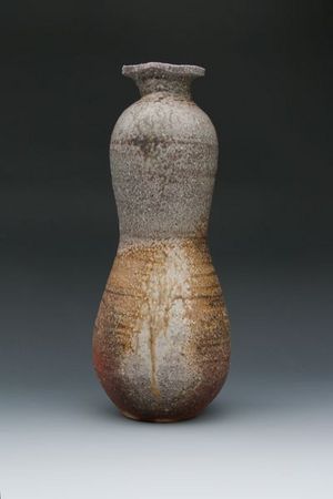 Tall Gourd Form, Shiga clay, fired in Sasayama Japan, with extensive  "landscape", flashing, natural ash glaze and both oxidized and reduced areas. 